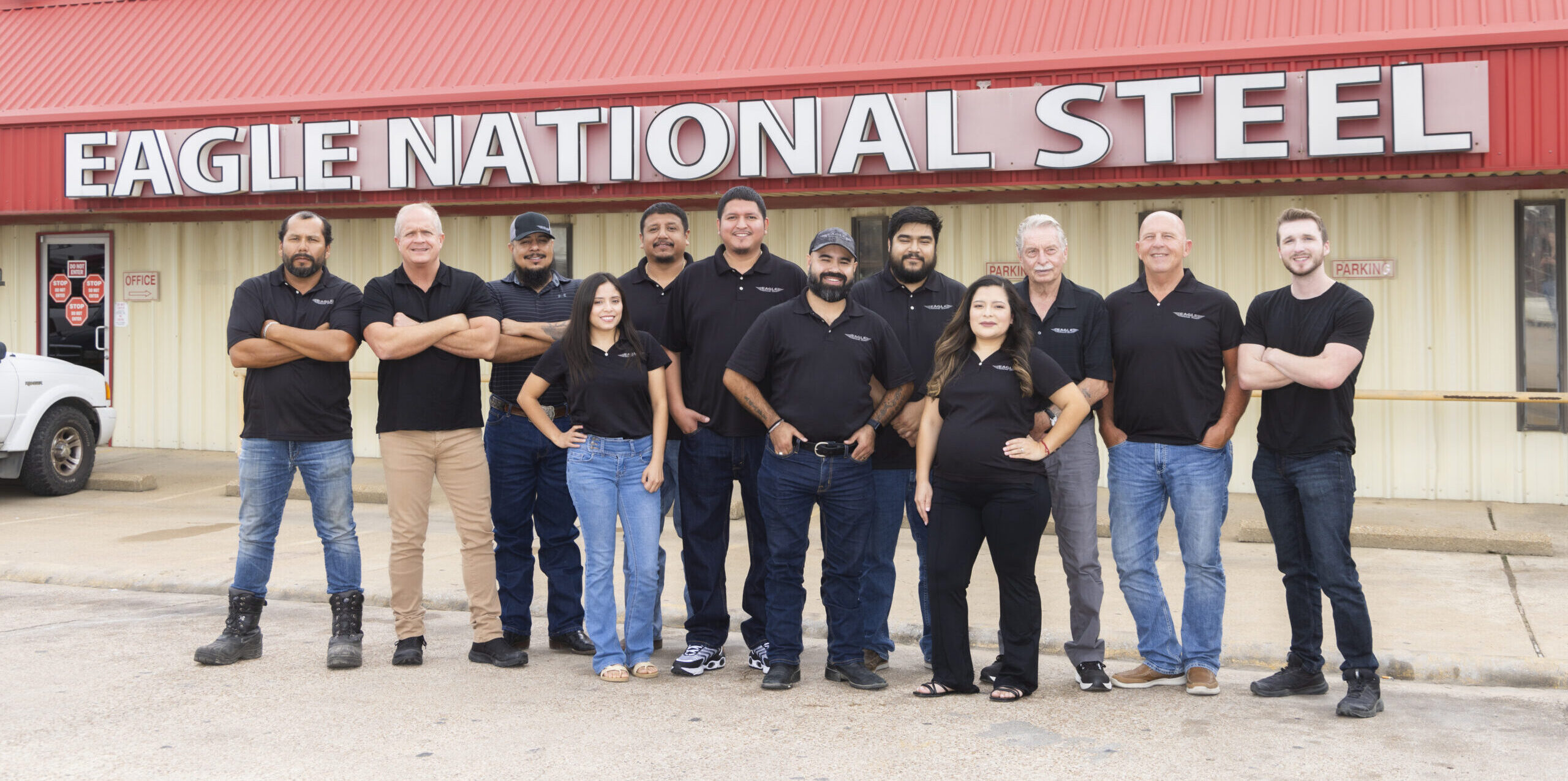 Eagle steel team standing in front of their location in Hutchins, TX