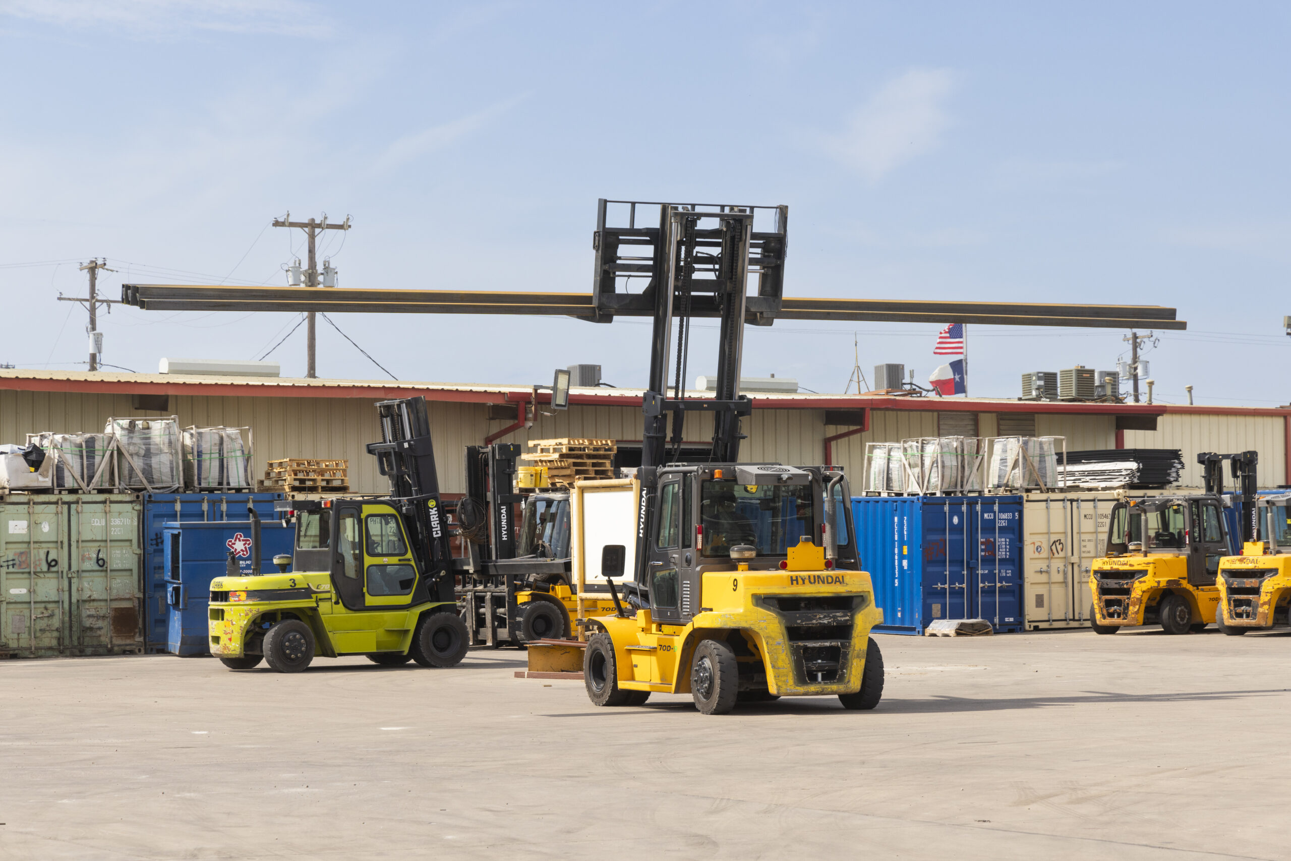 Forklift carrying steel